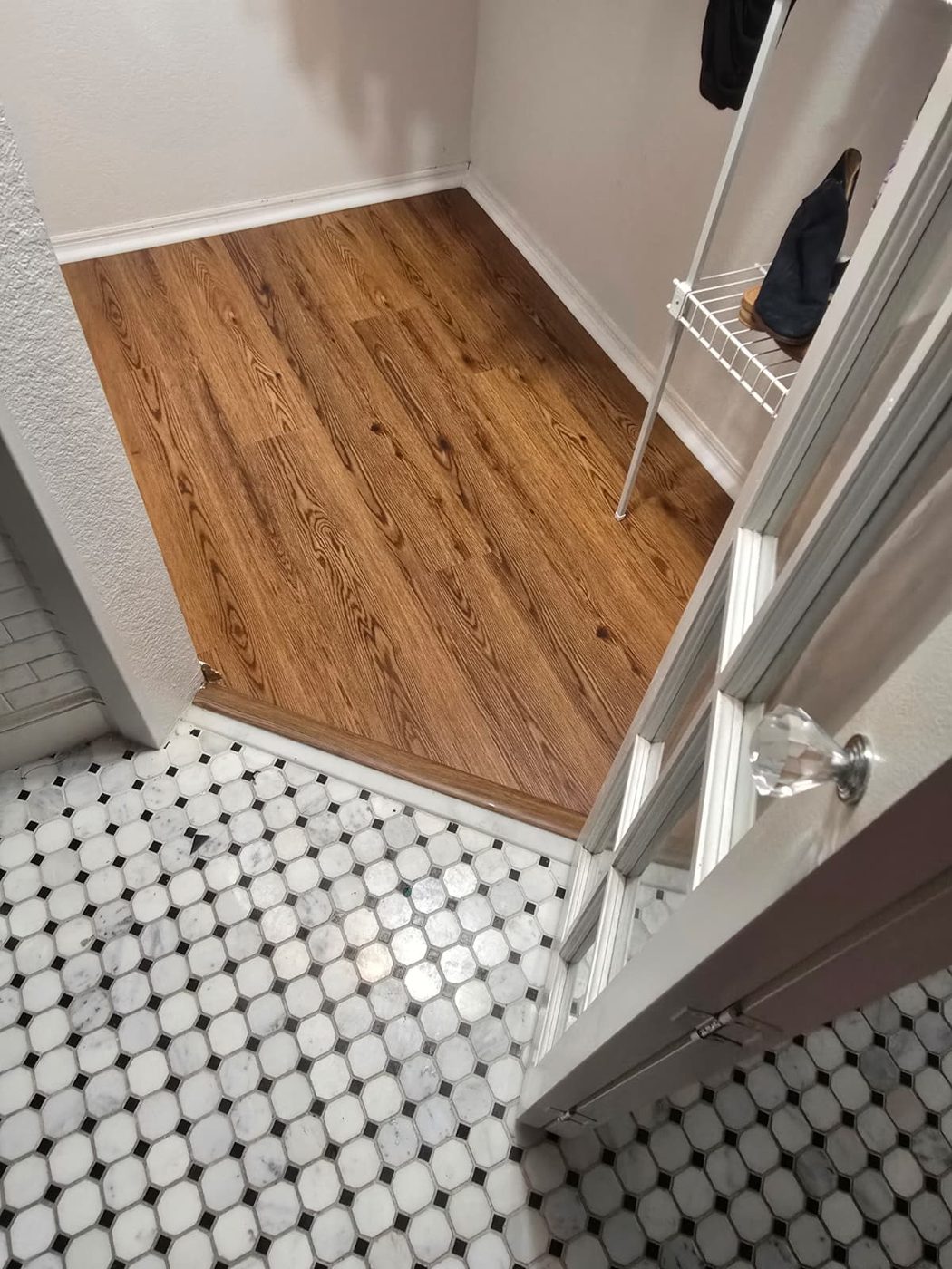 New vinyl plank flooring with tile transition
