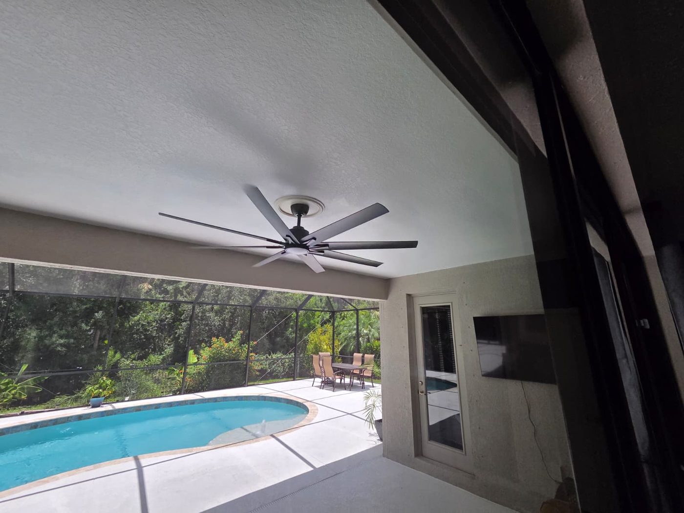 Ceiling fan installed over lanai pool