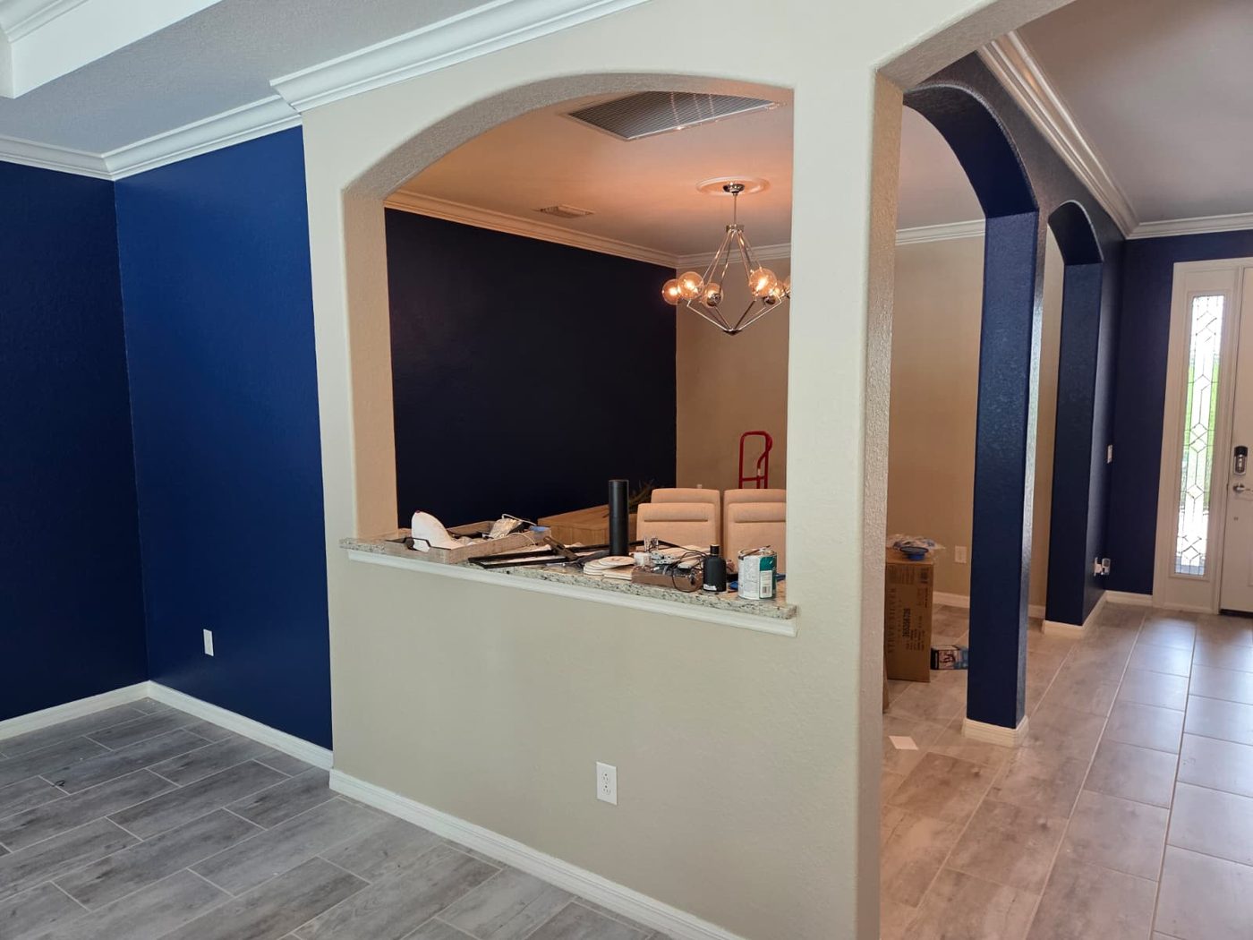 Navy painted room with archways