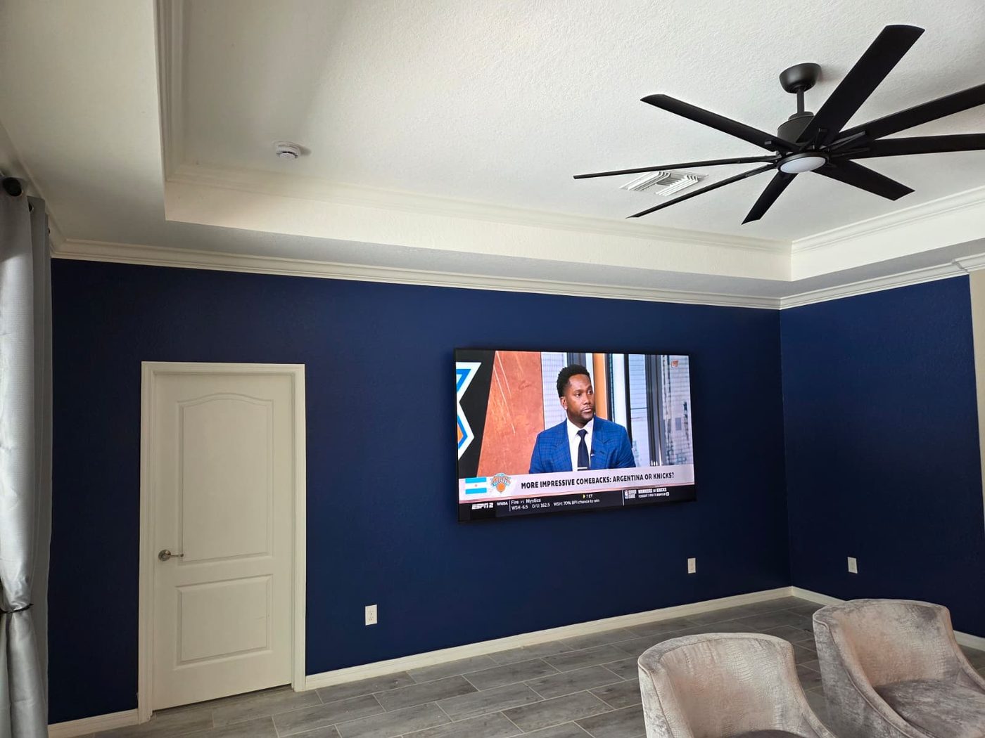 Mounted TV with ceiling fan